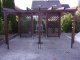Dřevěná pergola bez zastřešení je velmi pěkný estetický doplněk do každé zahrady